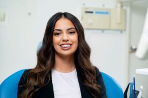 Happy, smiling patient with braces